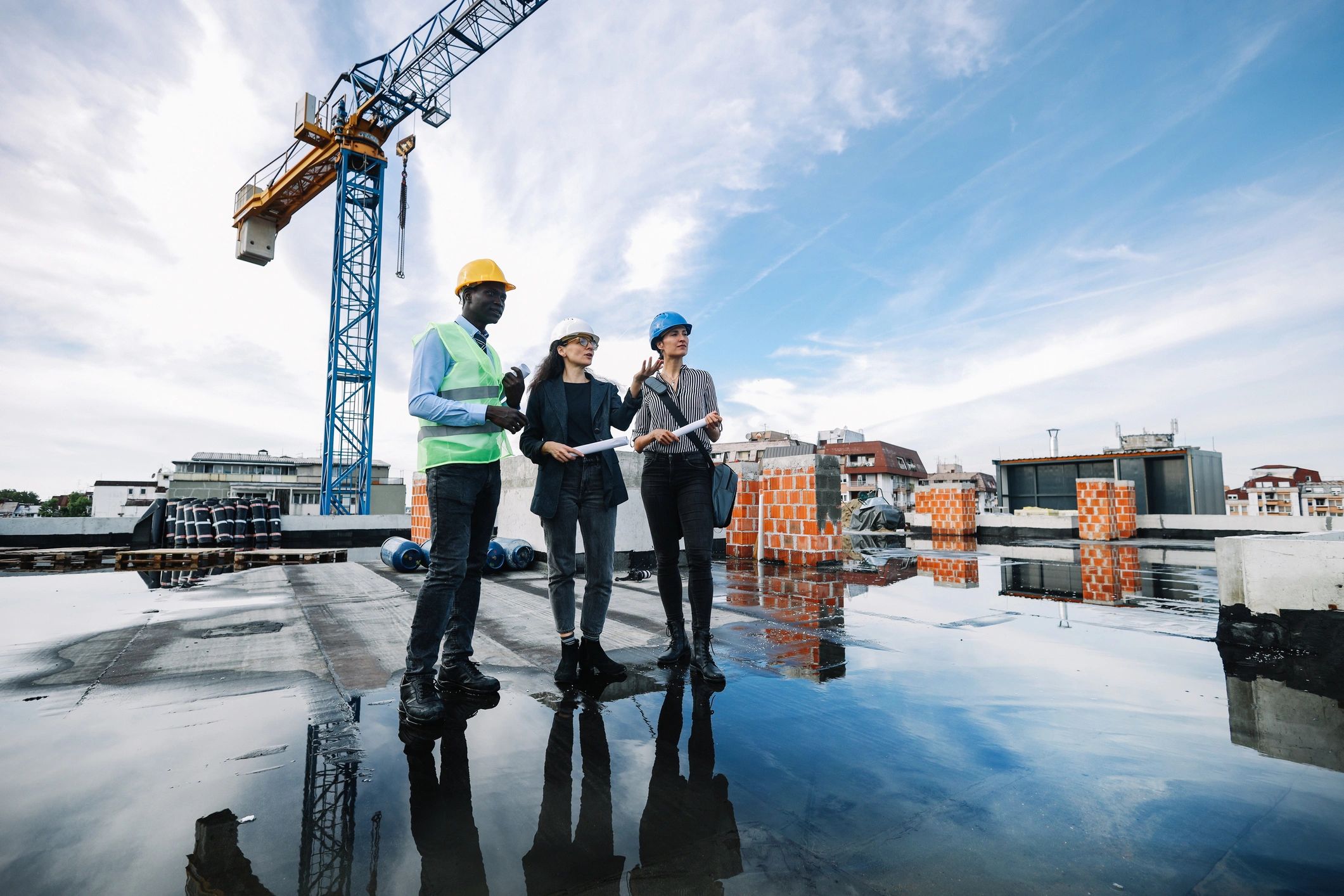 Construction professionals meeting on a residential building site