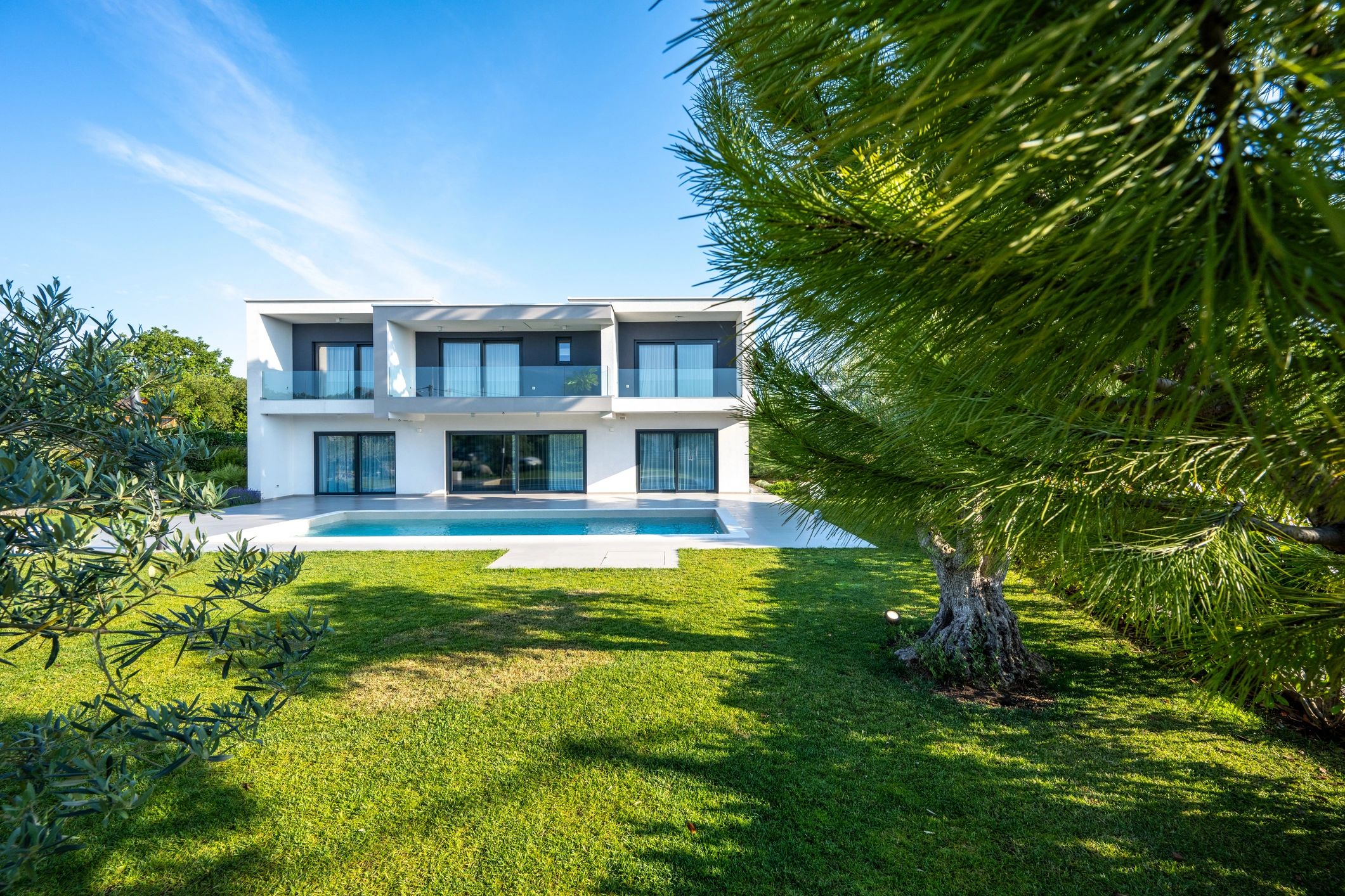 Luxury villa exterior with swimming pool